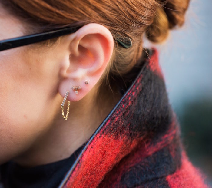 christine cameron wearing dainty earrings