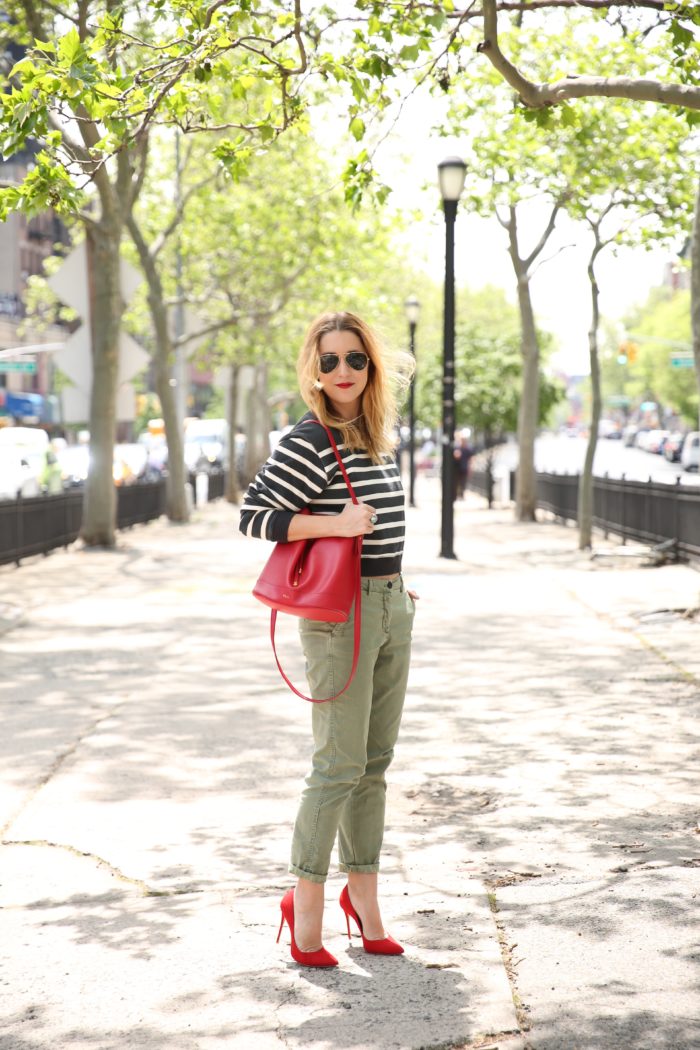 Christine Cameron of My Style Pill wearing a striped sweatshirt and khaki chinos 3